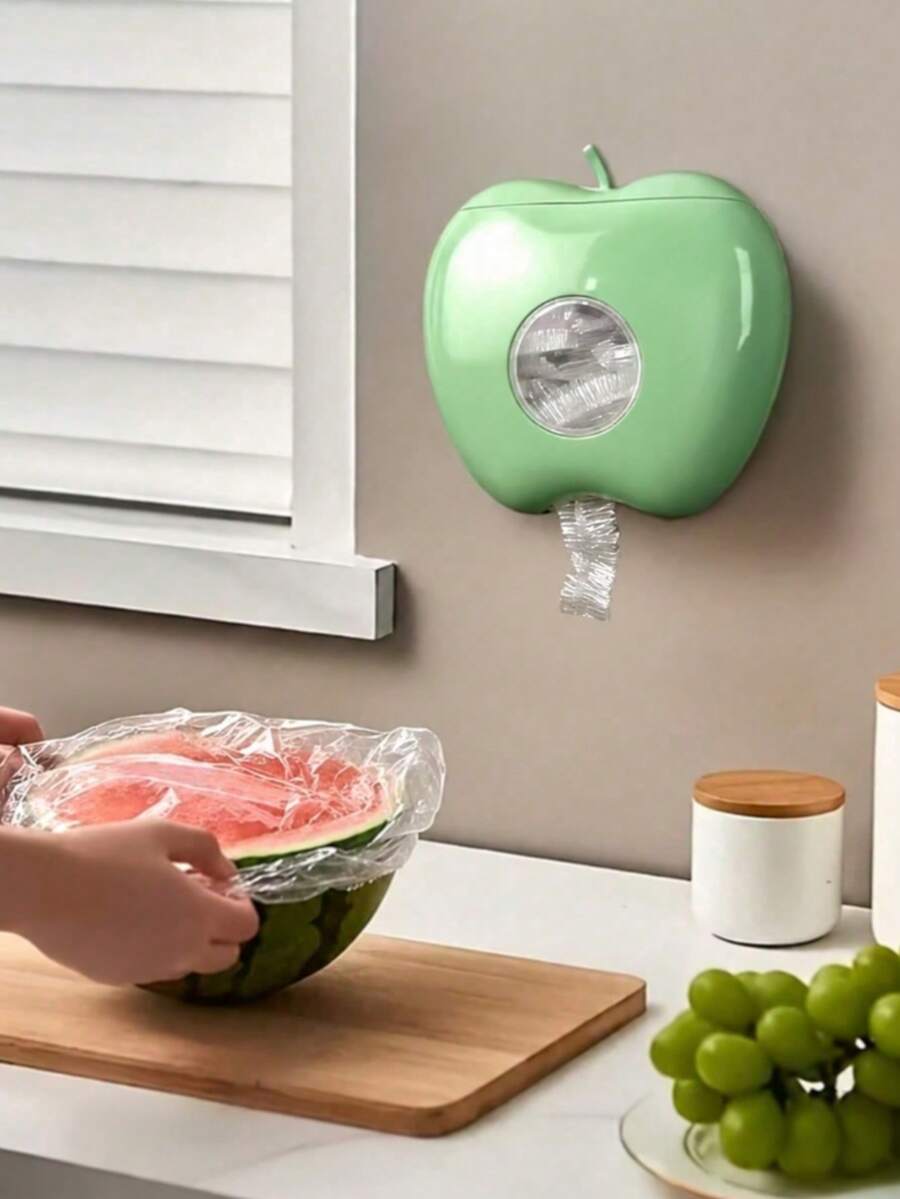 1 pieza Dispensador de película adherente para alimentos montado en la pared, caja de almacenamiento de película adherente elástica sin taladro con ventana transparente, soporte de bolsa de plástico con forma de manzana, almacenamiento de pared de cocina, ahorro de espacio en la despensa