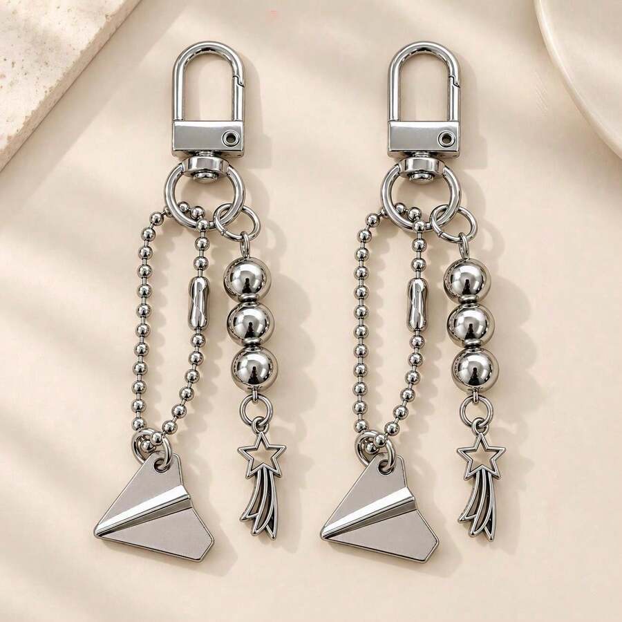 1pc/2pcs Unisex Alloy Paper Airplane Pendant, Beaded Five-Pointed Star Tassel Charm Accessory Keychain, Creative Personalized Keychain Bag Charm, Couple Pendant - Silver - View 1