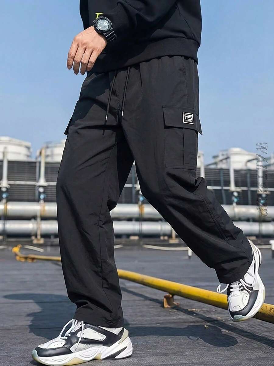 男士黑色戶外寬鬆運動工裝長褲,直筒寬腿,抽繩腰頭多口袋休閒褲,修身百搭日常通勤 - 黑色 - 查看 1