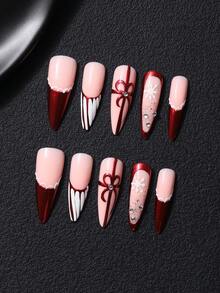 10pcs/Set Handmade Press-On Long Pointed Nails, Thickened Construction, Autumn/Winter Style, Hand-Painted French Red Metallic Texture, Hand-Painted Bow, Snowflake, White Lace Pattern, Transparent Rhinestone Inlay, Y2K Style, Christmas Holiday Style, Sweet & Cool Vibe, Includes 1pc Jelly Glue And 1pc Nail File. Suitable For Daily, Holiday And Party Nail Care. - Pink - View 1