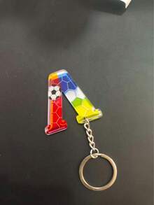 Random 1PC/5pcs Creative Football Theme Acrylic 26 Letter Keychain, Colorful Gradient Honeycomb Pattern Design With Football Graphic, Double-Sided Clear Printing Wear-Resistant, Compact Portable Pendant Accessory, Sturdy Metal Key Ring Not Easily Broken, Football Fan Merchandise Small Gift, Suitable For Bag, Key Decoration, Fun Portable Charm - A - View 4