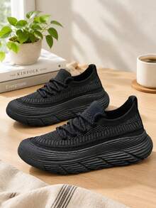 Tenis para hombre de malla knit con cordones y suela gruesa, tenis casuales antideslizantes, calzado deportivo versátil para diario - Negro - Ver 5