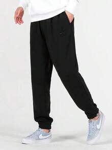 Nike Men's Black Solid Color Logo Print Knitted Training Cuffed Sweatpants - Black - View 1