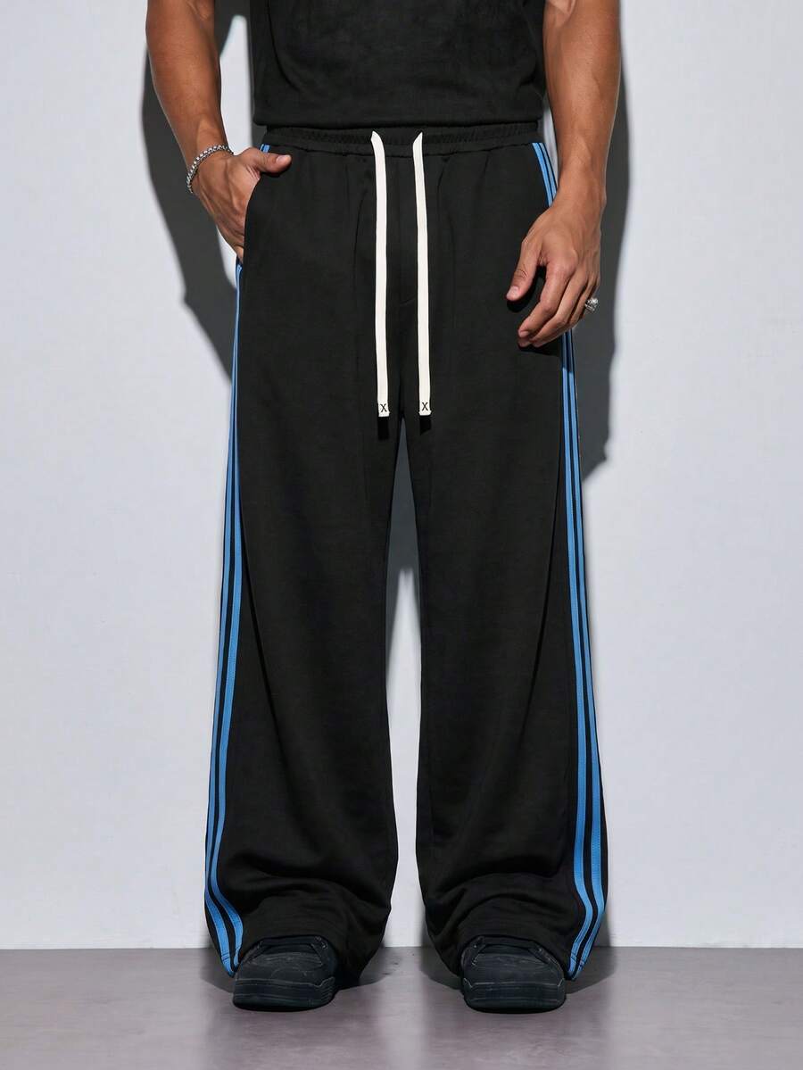 Modcrash 1pc Men's Autumn Black Base Blue 4-Stripes Curved Hem Wide Leg Sweatpants, White Drawstring Elastic Waistband, Casual Sports Long Pants Fall/Winter - Black - View 1