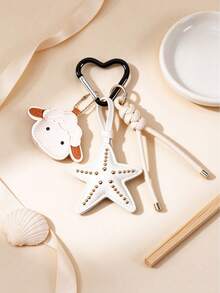 1pc Cute Sheep & Starfish Combination Keychain, Sweet & Cool Style Leather Bag Charm With Heart-Shaped Carabiner And Braided Rope Design. Sheep Head + Riveted Starfish Dual Pendant, Exquisite Stitching Craftsmanship, Metal Rivet Accents, Delicate Texture. Can Be Hung On Backpack, Handbag, Car Keys, Easily Enhance Outfit Vibe. Girly Versatile Accessory, Daily Street Decor Item, Also Suitable As Creative Small Gift For Best Friends, Simple Yet Eye-Catching. - White - View 1