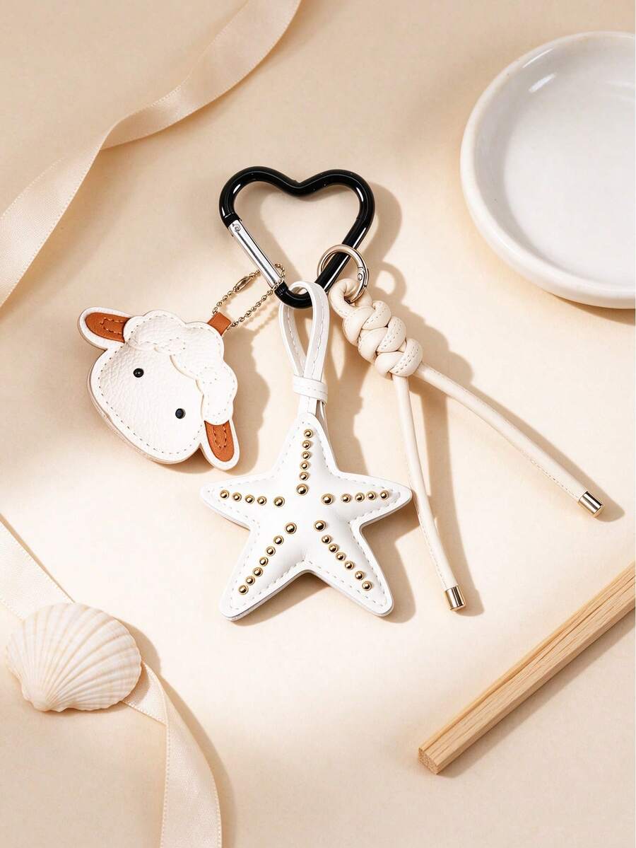 1pc Cute Sheep & Starfish Combination Keychain, Sweet & Cool Style Leather Bag Charm With Heart-Shaped Carabiner And Braided Rope Design. Sheep Head + Riveted Starfish Dual Pendant, Exquisite Stitching Craftsmanship, Metal Rivet Accents, Delicate Texture. Can Be Hung On Backpack, Handbag, Car Keys, Easily Enhance Outfit Vibe. Girly Versatile Accessory, Daily Street Decor Item, Also Suitable As Creative Small Gift For Best Friends, Simple Yet Eye-Catching. - White - View 1