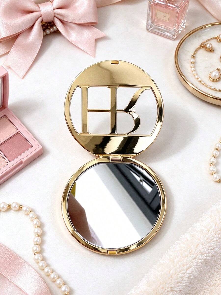 Helena Rubinstein Gương trang điểm gấp gọn phong cách vintage sang trọng, vỏ kim loại chạm khắc logo, mặt gương HD, dặm lại lớp trang điểm rõ nét không dễ biến dạng, phù hợp để chỉnh trang khi đi làm, đi chơi hay du lịch, thích hợp dùng cá nhân hoặc làm quà tặng HELENA - Vàng - Xem 1