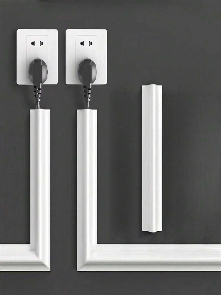 A Roll Of Self-Adhesive Floor Cable Protector, Designed To Manage Power Cords, With A White Base Cover To Prevent Cables From Tangling On Floors, Walls, And Desks