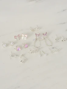 Clariva 11对猫眼石耳钉套装，配浅色蝴蝶结、闪亮粉色耳环、锌合金水钻耳环，时尚百搭，适合日常佩戴，是送给女朋友的圣诞礼物。
