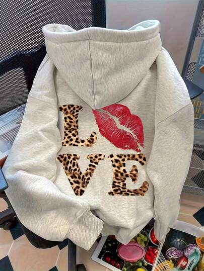 sweat-shirt à capuche décontracté pour femmes avec imprimé léopard en forme de cœur et lettres "L LOVE VE", couleur unie, manches longues, poche, épaules tombantes. Vêtements d'automne pour femmes, retour à l'école
