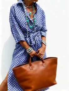 Đầm sơ mi tay ngắn dáng rộng kẻ sọc cỡ lớn dành cho nữ, kiểu dáng thường ngày có vai rớt, thắt lưng, xẻ tà, phù hợp cho công sở, du lịch mùa xuân/thu. - Màu xanh lam - Xem 1