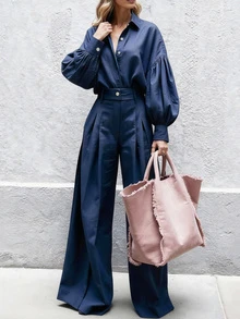 女士休闲时尚秋冬新款金属纽扣纯色领泡泡袖长袖衬衫搭配百搭阔腿裤套装，适合外出、工作、聚会，优雅时尚的通勤装扮，春季必备。 - 藏蓝色 - 查看 2