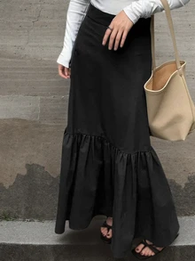 2025时尚日报优雅街头通勤纯色拉链拼接女式长裙，适合春、秋、冬季穿着