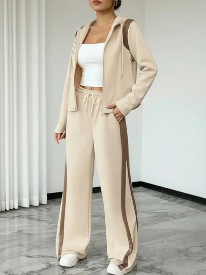 女士休闲长袖拉链上衣和直筒裤两件套，秋季；优雅撞色连帽抽绳运动套装，条纹和纯色拼接，休闲口袋拉链抽绳设计，适合办公室和日常穿着，春夏秋季皆宜。