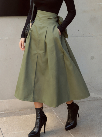 Vestidos elegantes de estilo europeo y estadounidense para festivales rave, nuevos vestidos de línea A para vacaciones, ropa de otoño para mujer, falda paraguas con lazo, falda larga de corte amplio de cintura delgada, falda de unicolor para todas las estaciones, falda corta para volver al colegio