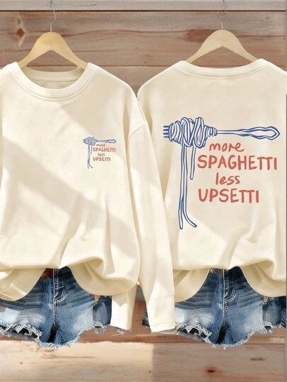 一件少女休闲印花长袖T恤，时尚保暖，穿着舒适，适合年轻学生，春秋季穿着。