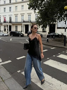 above the aurora Women's Sexy & Elegant Asymmetric Sleeveless Black Lace Blouse, New Spring/Summer 2026 Collection - Black - View 1