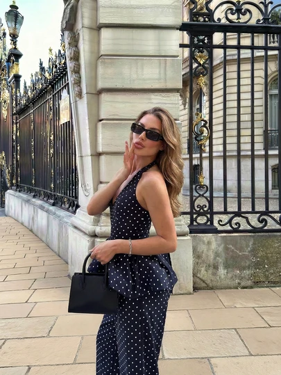 Conjunto elegante de mono de mujer con lunares azul marino, de cuello halter, con pantalones de pierna ancha con volantes en la cintura, un conjunto de dos piezas para usar en citas diarias, brunch y fiestas