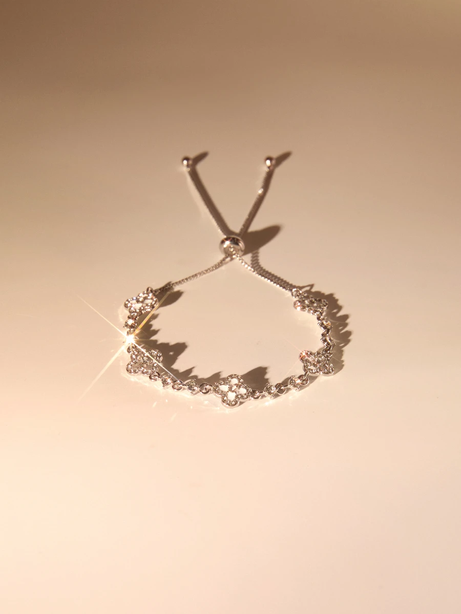 Etoivie 1条时尚锆石四瓣花手链，可调节长度，轻盈奢华，优雅时尚，适合女性参加派对、约会、度假，也是送给新娘的特别礼物。 - 銀色 - 查看 1