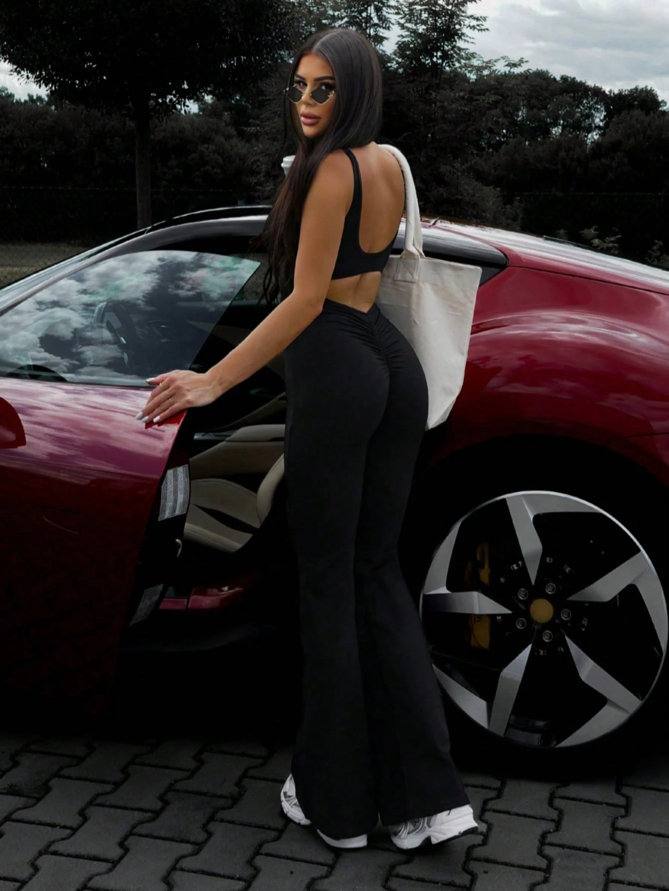 Bộ jumpsuit thể thao năng động, thoải mái, không tay, hở lưng, có bèo nhún, dáng ôm, thích hợp cho mùa xuân/hè, trang phục đi nghỉ mát cho nữ. - màu đen - Xem 1