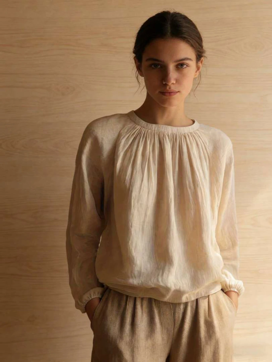 Áo sơ mi nữ dài tay cổ tròn chất liệu chiffon không co giãn, viền bèo nhún. Kiểu dáng tối giản, thời trang mùa hè, tạo nên phong cách bohemian. Áo sơ mi nữ thường ngày. - Màu be - Xem 1