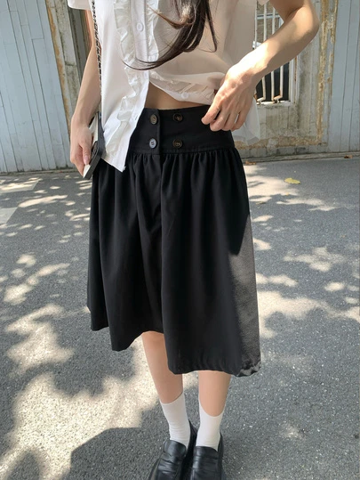 韩版复古黑色碎花褶皱蓬蓬中长休闲百搭半身裙，适合女性春季穿着