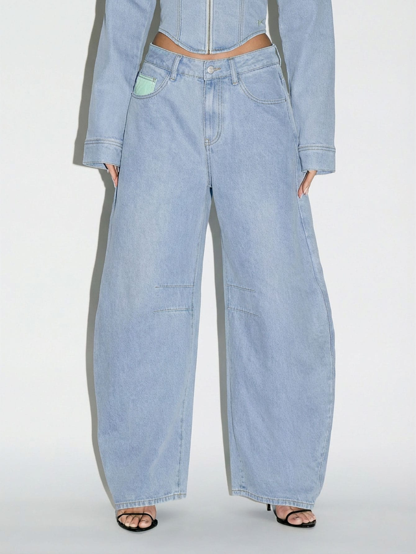 KIZN Jeansy typu baryłkowa z szerokimi nogawkami i surowym obszyciem