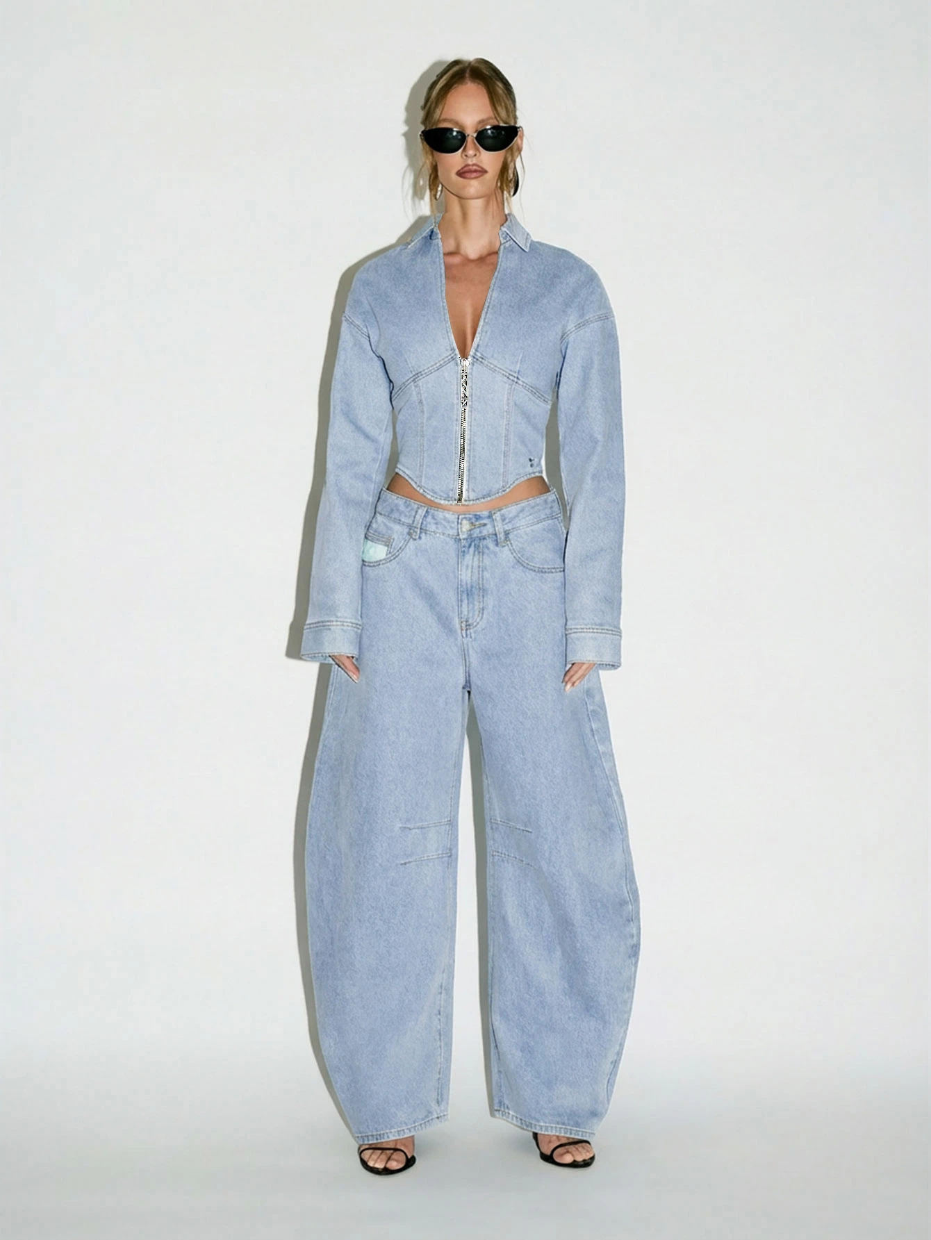 KIZN Jeansy typu baryłkowa z szerokimi nogawkami i surowym obszyciem