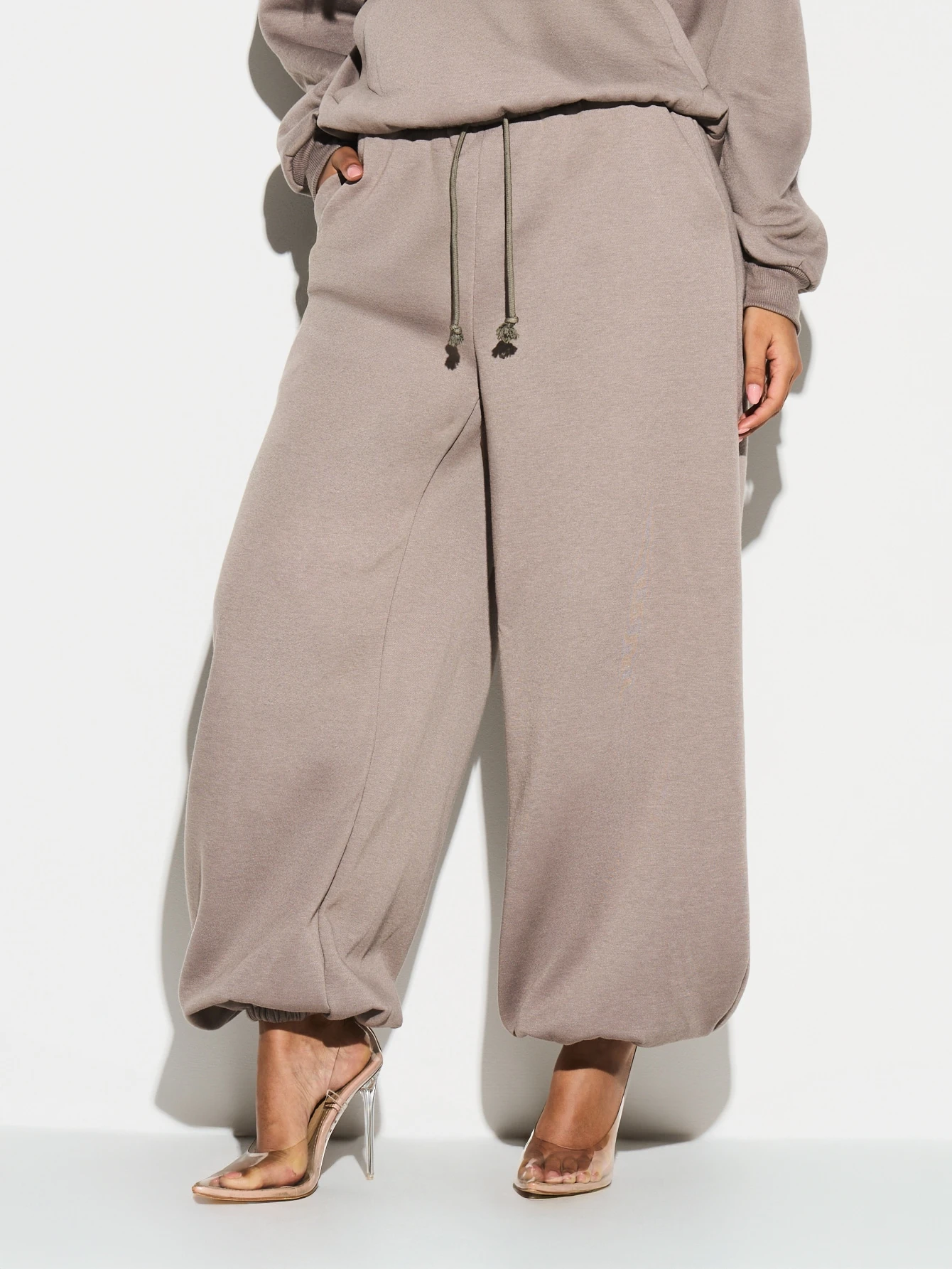 KIZN Pantaloni da jogging color talpa con coulisse e orlo risvoltato