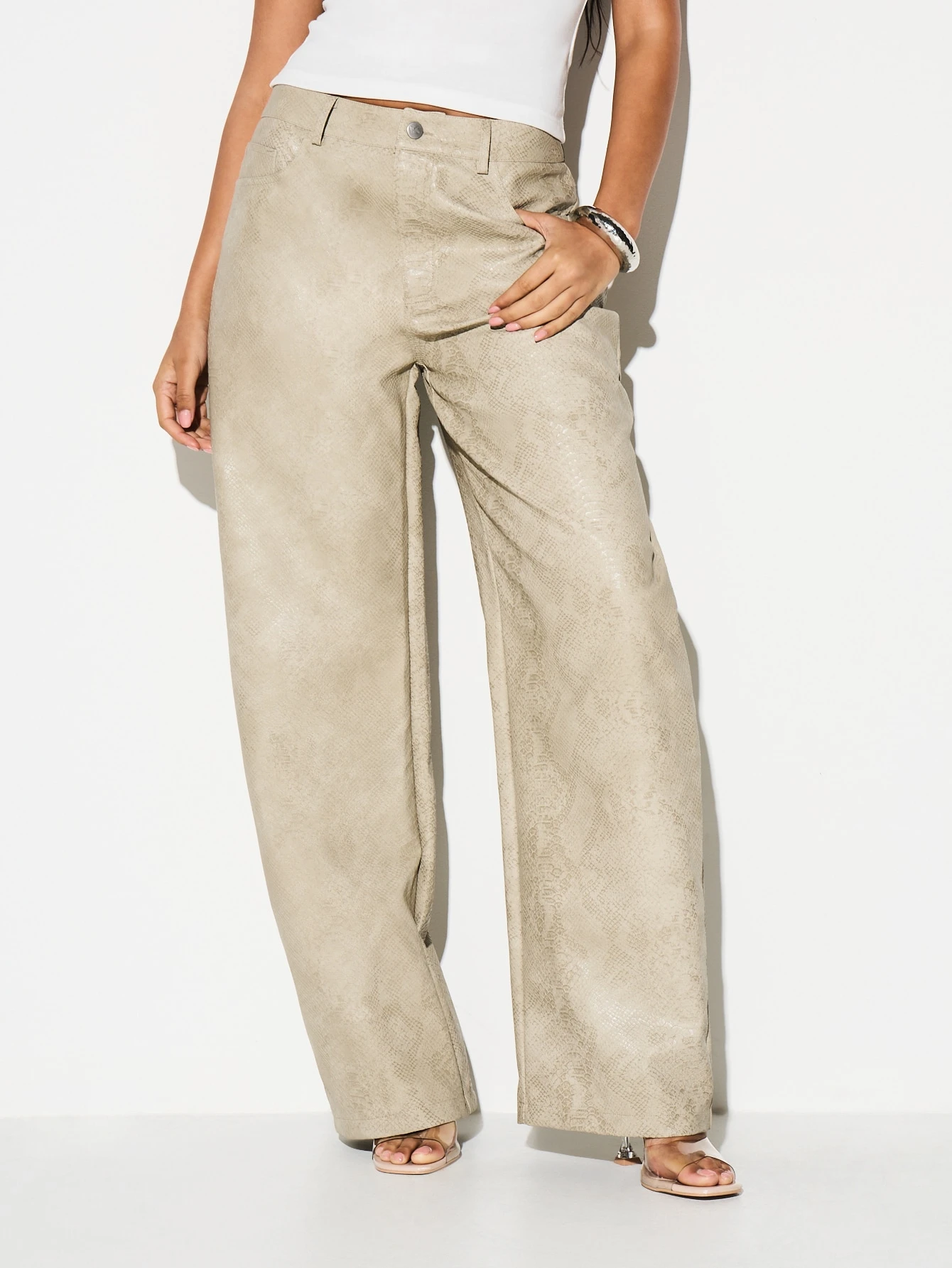 KIZN Pantaloni a gamba larga in similpelle con stampa serpente