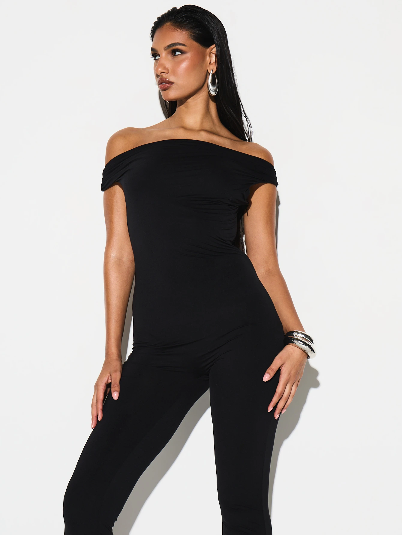 KIZN Off Shoulder Asymmetric Jumpsuit Fitted Leg