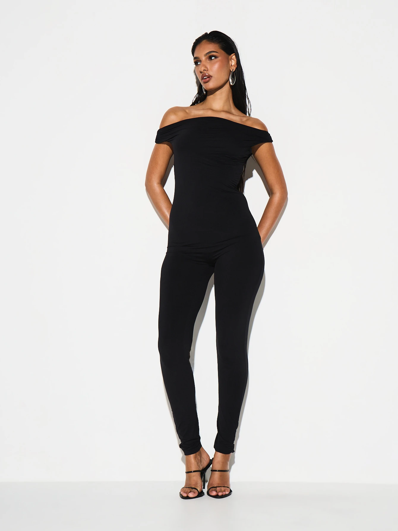 KIZN Off Shoulder Asymmetric Jumpsuit Fitted Leg