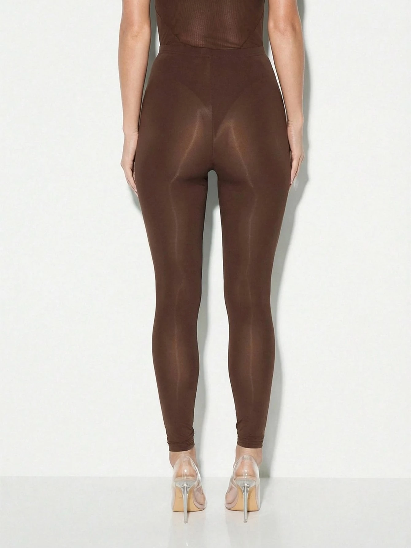 KIZN Leggings de malha com detalhes de botões e cintura alta.