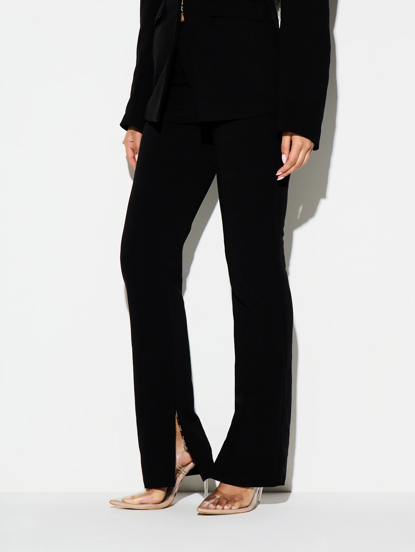 KIZN Pantalon noir tailleur à ourlet fendu
