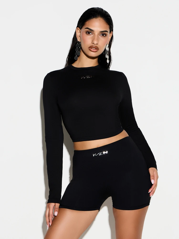 KIZN Shoulder Pad Long Sleeve Fitted Crew Neck T-Shirt With Metallic Logo Detail For Women Fall Winter