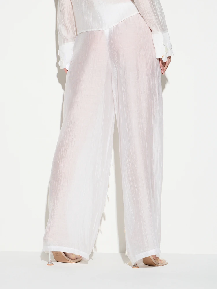 KIZN Białe, prześwitujące, koralikowe spodnie palazzo z perłami