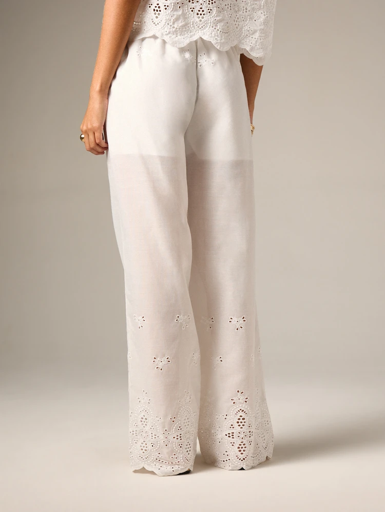 White Embroidered Palazzo Pants With Eyelet Detail