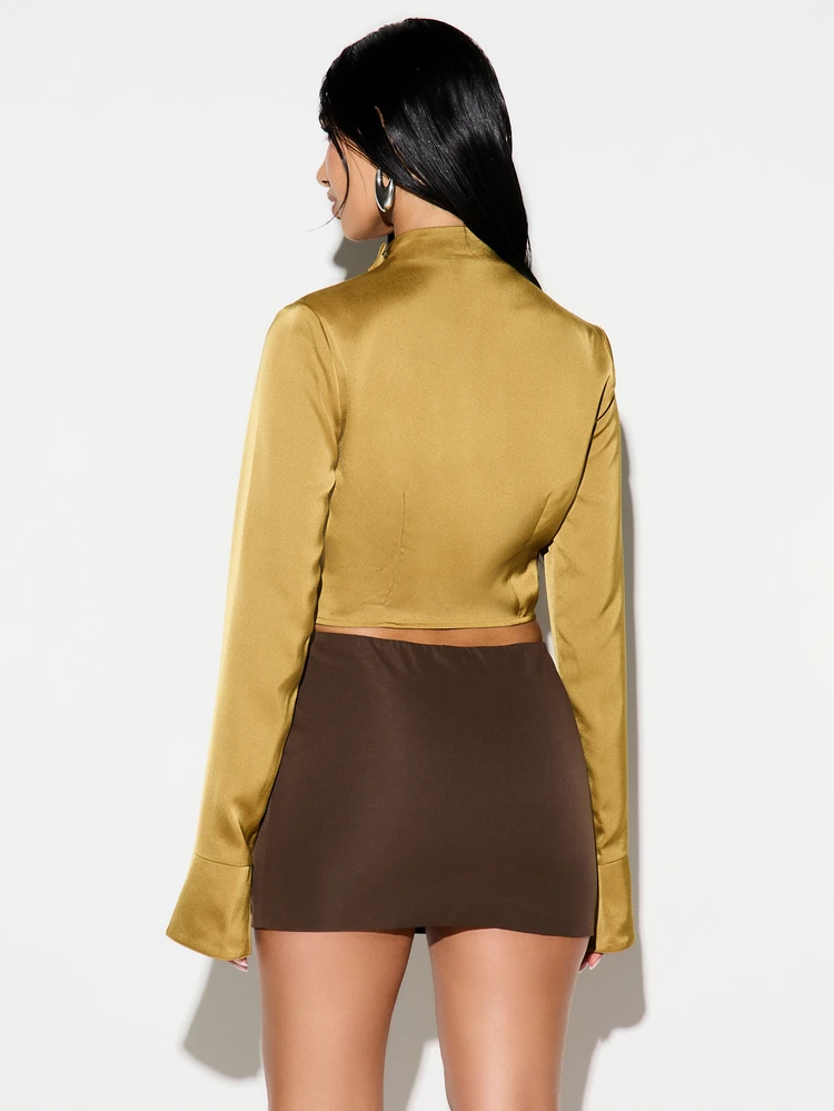 KIZN Wrap Over Cut Out Cinched Long Sleeve Blouse With High Neck And Bell Sleeves For Evening Party Occasions