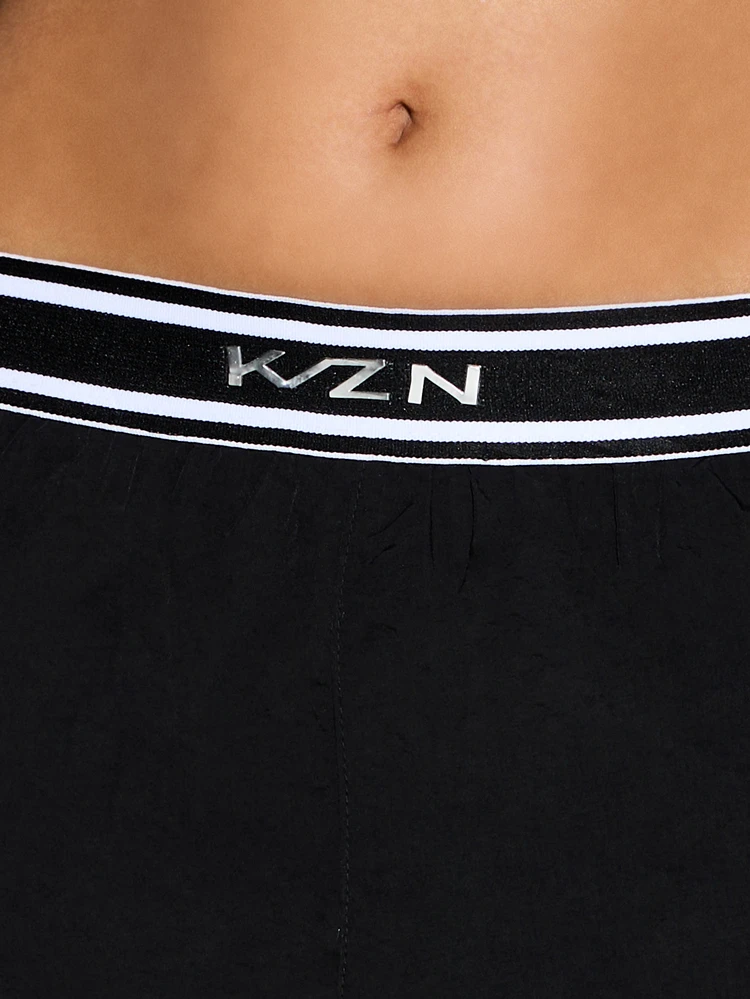 KIZN Short de sport noir avec ceinture logotée