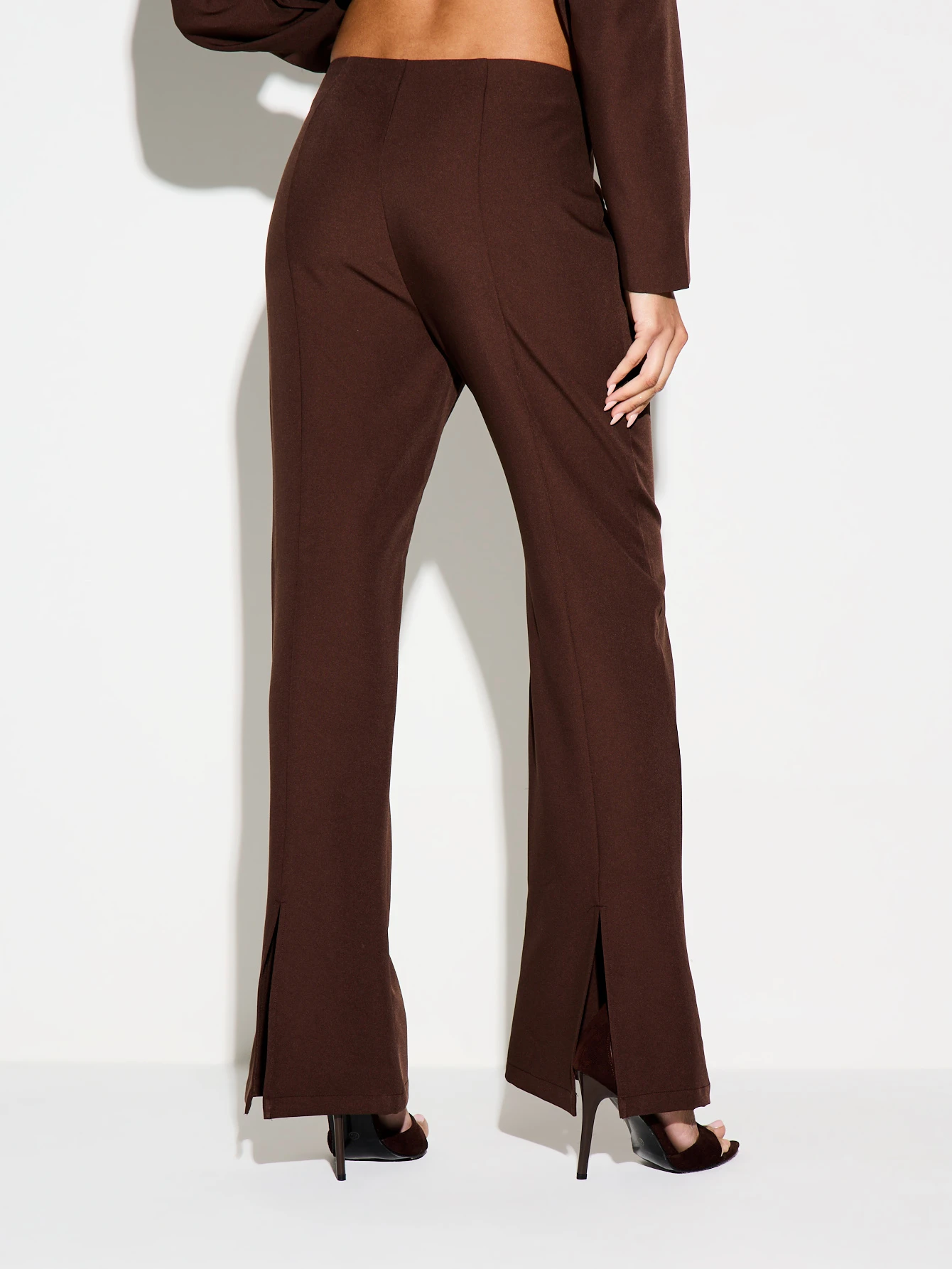 KIZN Calças flare com bainha dividida sob medida