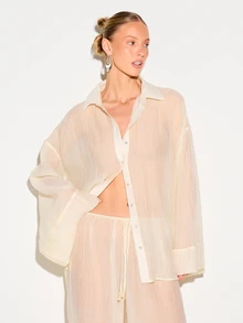 KIZN Camisa de mujer de manga larga y cuello con botones, de corte ancho y holgado, con textura arrugada y transparente, perfecta para capas casuales en primavera y verano - Amarillo claro - Ver 1