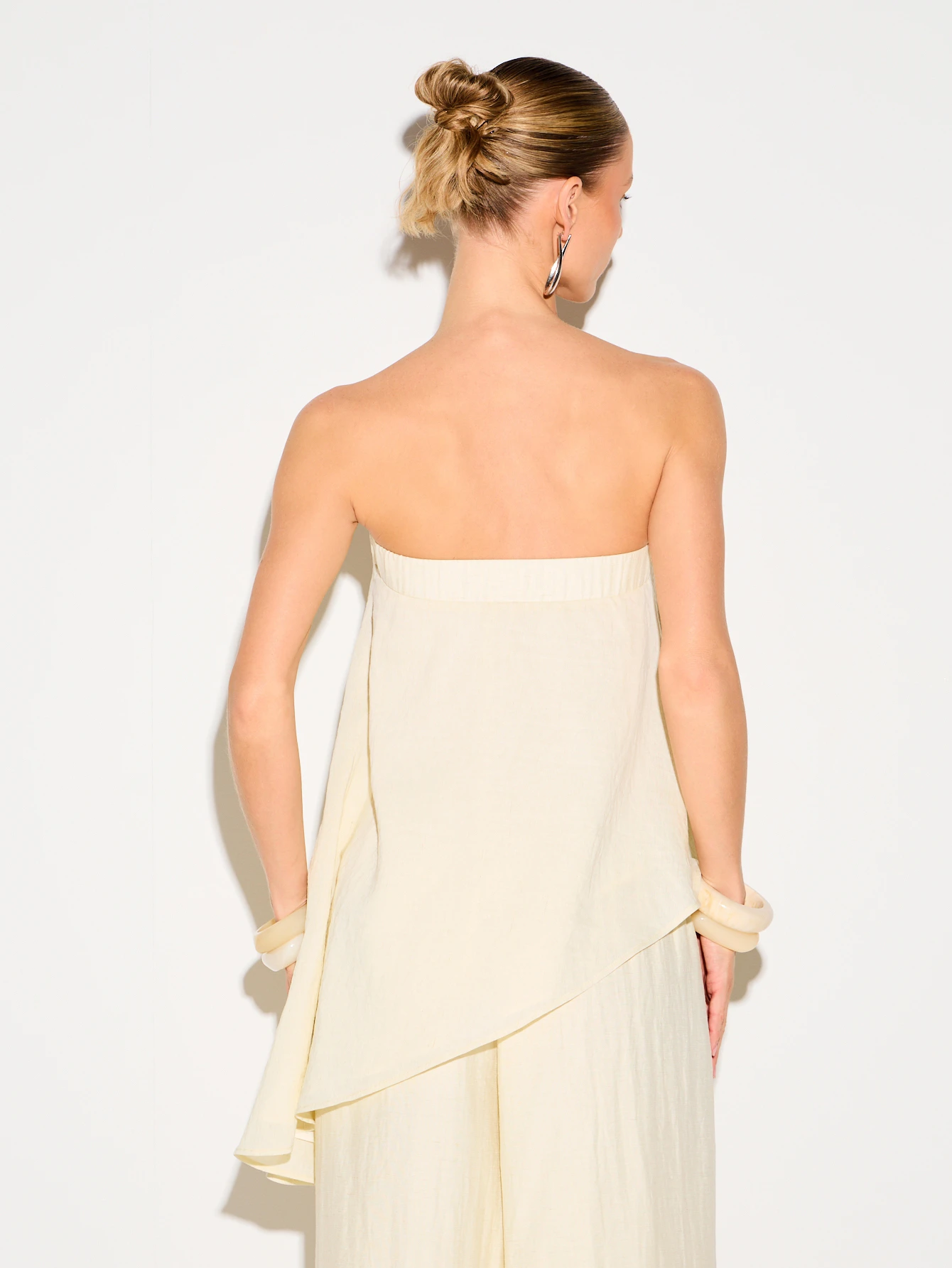 KIZN Strapless Linen Asymmetric Top With Ruffles