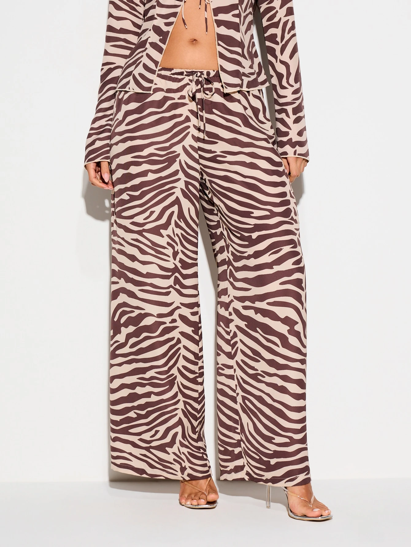 KIZN Pantaloni a gamba larga con stampa zebrata e coulisse
