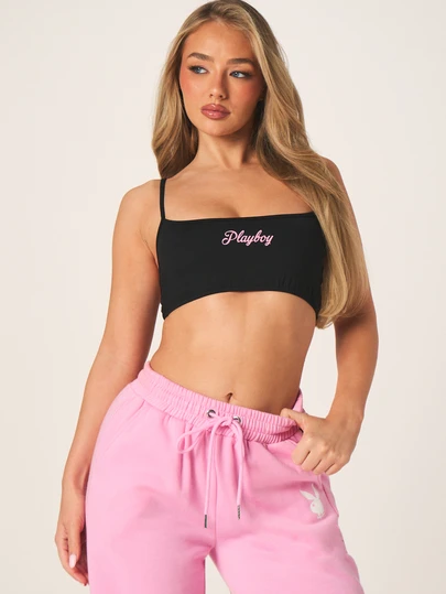 Missguided x Playboy Script Graphic Black Sports Bra With Pink Embroidered Logo And Adjustable Straps For Comfort