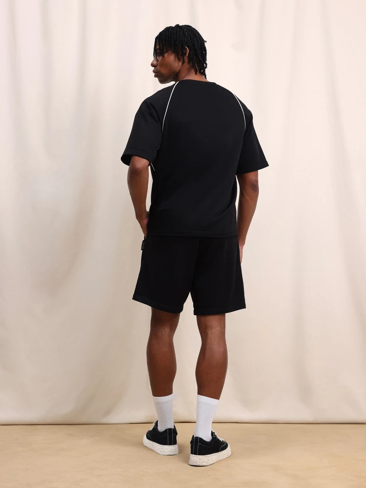 メンズ ブラック オーバーサイズTシャツ ショーツセット ホワイトパイピング スポーツカジュアル 夏 コーディネート 2ピース