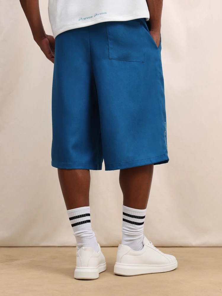 PLAYBOY X SUMWON 남성 블루 나일론 조츠 릴렉스 핏 무릎 길이 그래픽 프린트 여름 캐주얼 농구 반바지 와이드 레그 드로스트링 허리 밴드 경량 스트릿웨어