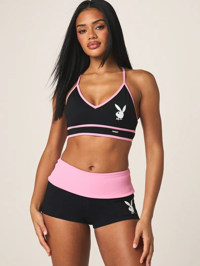 Missguided x Playboy Áo bra thể thao nữ không dây lưng, có logo, thiết kế chéo lưng và viền hồng tương phản.