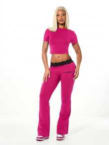 BABYPHAT Quần legging nữ màu hồng ống loe với chi tiết ren ở eo và viền đen, thích hợp cho phong cách thời trang thường ngày. - Màu Hồng Tươi - Xem 7