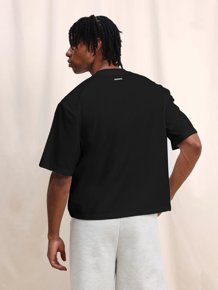 T-shirt classique à manches courtes, col ras-du-cou, coupe régulière, en coton noir, pour un port décontracté et quotidien en été