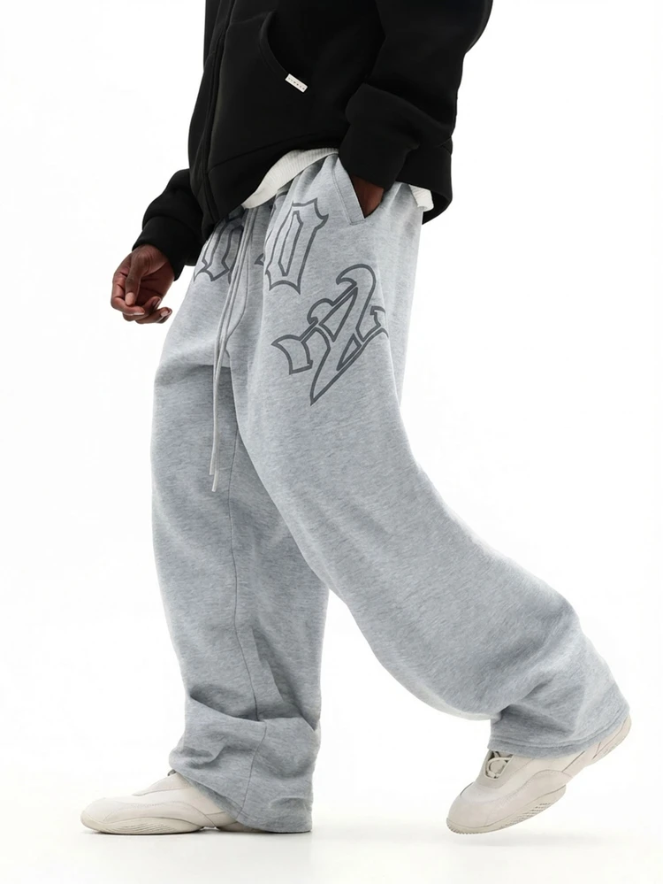 Pantalon de jogging ample pour hommes avec graphiques gothiques sur l'entrejambe, streetwear décontracté et confortable pour l'automne et l'hiver